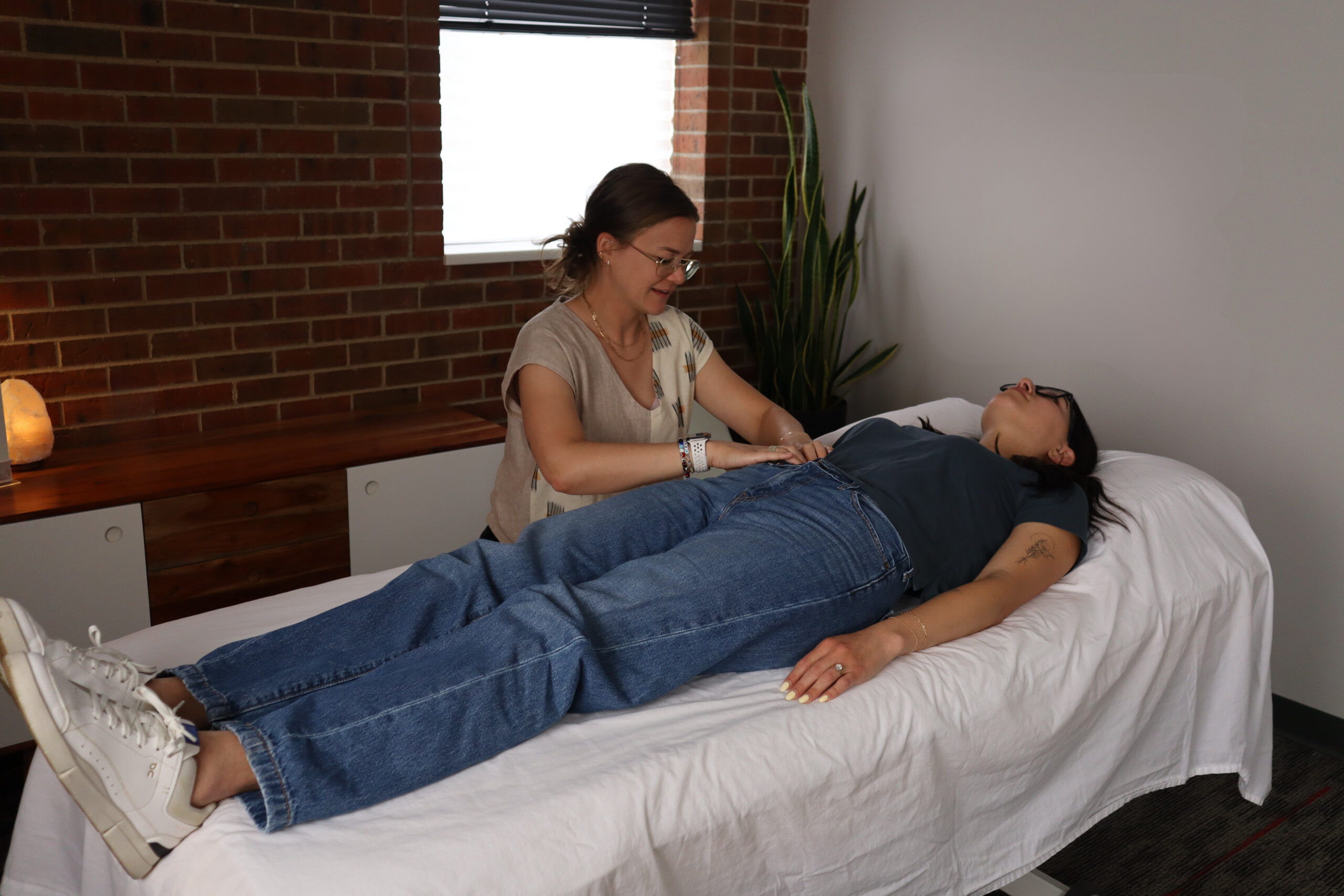 Visceral Manipulation 3 Dr. Woods hands on patient's abdomen